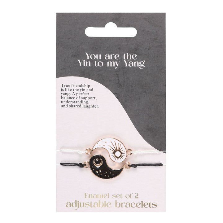 Yin and Yang friendship bracelets with sun and moon charms in nickel-free stainless steel.
