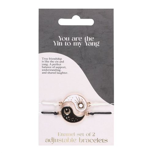 Yin and Yang friendship bracelets with sun and moon charms in nickel-free stainless steel.