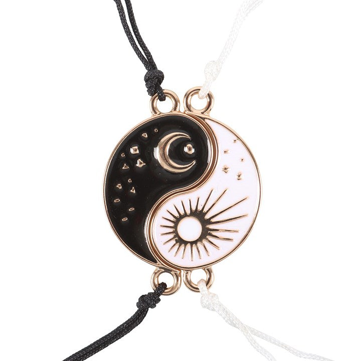 Yin and Yang friendship bracelets with sun and moon charms in nickel-free stainless steel.
