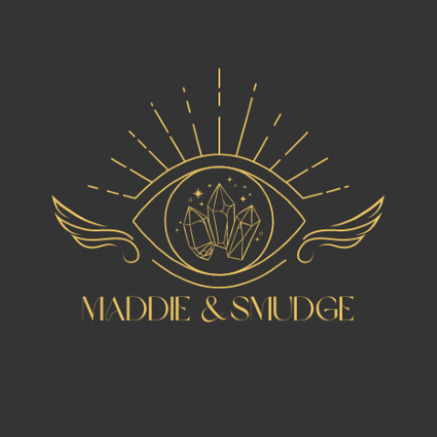 Maddie and Smudge Logo Black Background with Gold Mystical Eye filled with crystals 