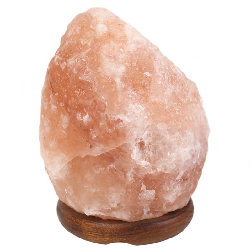 3-4kg Himalayan salt lamp with warm amber glow, showcasing natural crystal texture, placed on a wooden surface