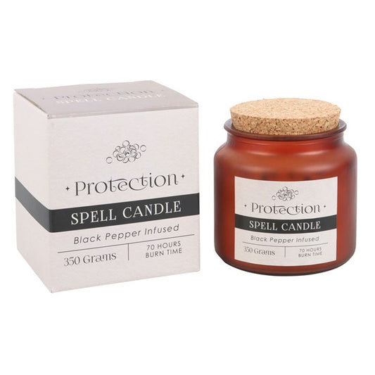 Black Pepper Infused Protection Spell Candle in a frosted glass jar with cork lid, designed to shield against negative energy and attract positive vibrations.