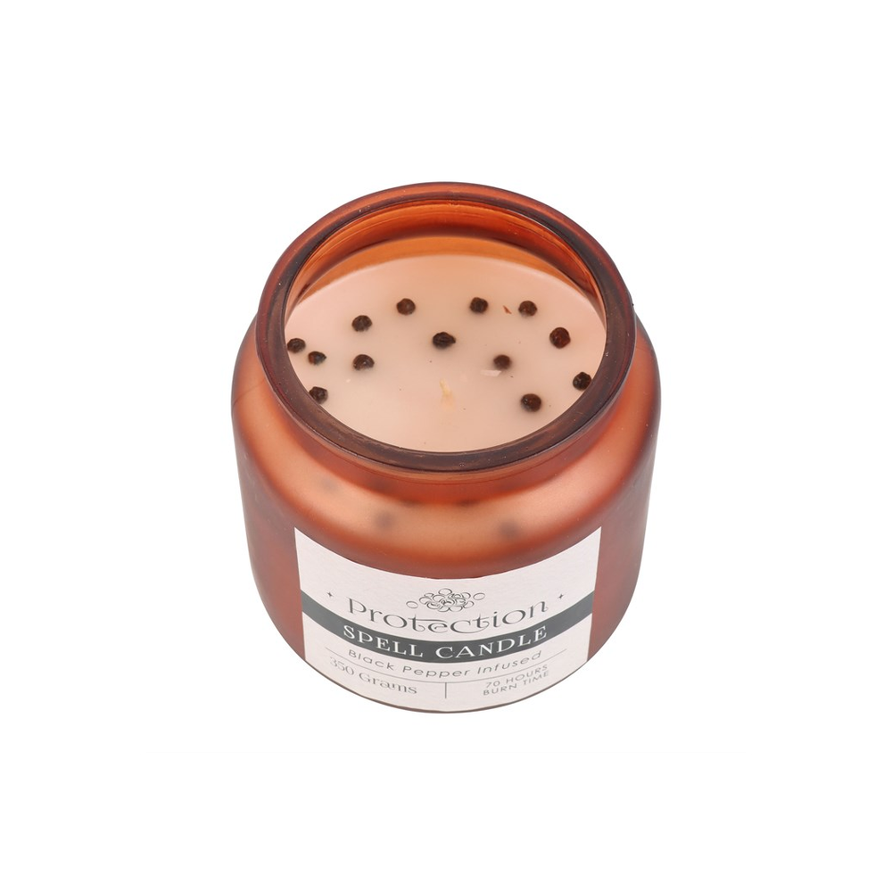 Black Pepper Infused Protection Spell Candle in a frosted glass jar with cork lid, designed to shield against negative energy and attract positive vibrations.