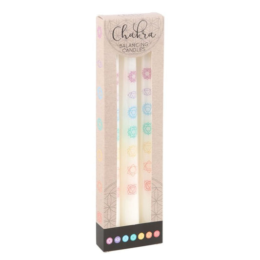 Set of 3 Chakra Balancing Taper Dinner Candles featuring vibrant colors representing the seven chakras, perfect for adding elegance and spiritual symbolism to home décor.