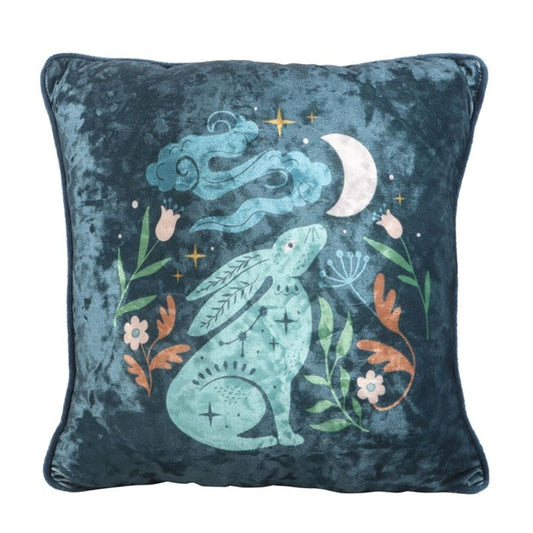 Midnight Hare Cushion in steel blue velvet featuring an elegant moon gazing hare illustration, perfect for adding a magical touch to home decor.