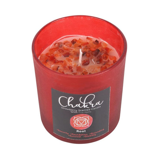 Root Chakra strawberry-scented candle in red frosted glass with metallic lid, featuring fire agate crystal chips for grounding, approximate burn time 25 hours.