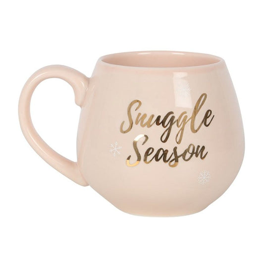 Pretty pink Snuggle Season ceramic mug with rose gold detailing, perfect for cosy winter drinks