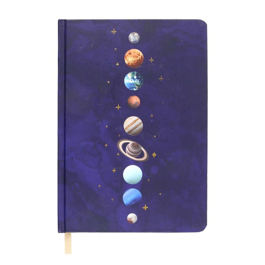 Solar System A5 Notebook featuring a cosmic design with 9 planets, gold-tone stars, gold foil pages, and a gold ribbon marker, set against a deep blue background.