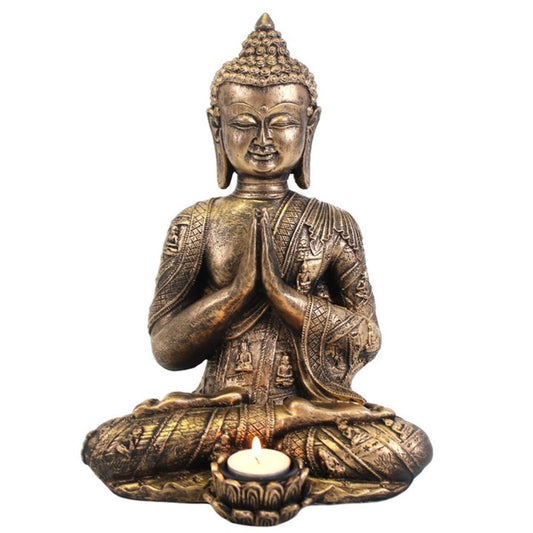 Large Gold Effect Thai Buddha Tealight Holder in a meditative pose, designed to hold a tealight candle and add tranquility to home decor.