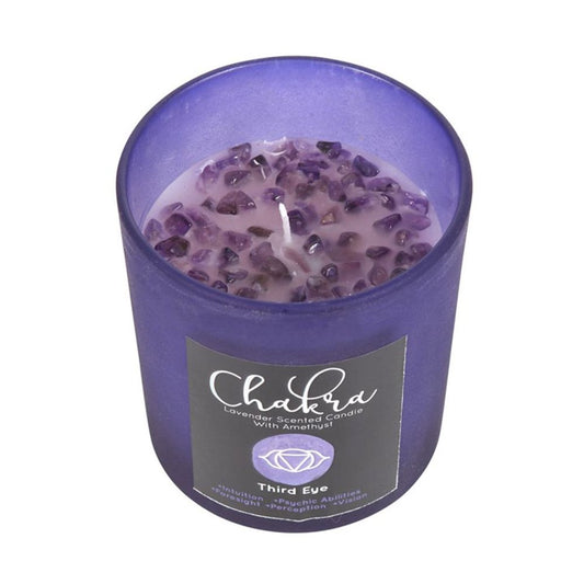 Third Eye Chakra lavender-scented candle in purple frosted glass with metallic lid, featuring amethyst crystal chips for intuition and clarity, approximate burn time 25 hours.